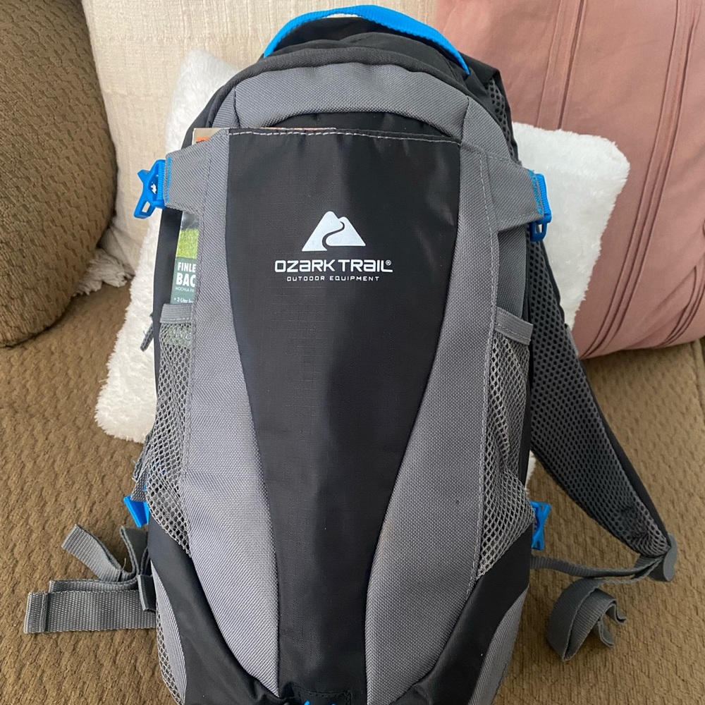 Hiking backpack with straw